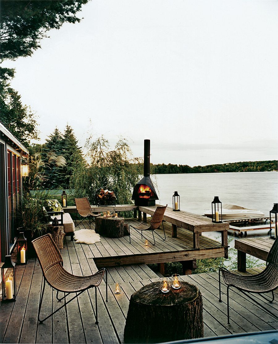 Fireplace and lighting give the lakeside deck a surreal appeal
