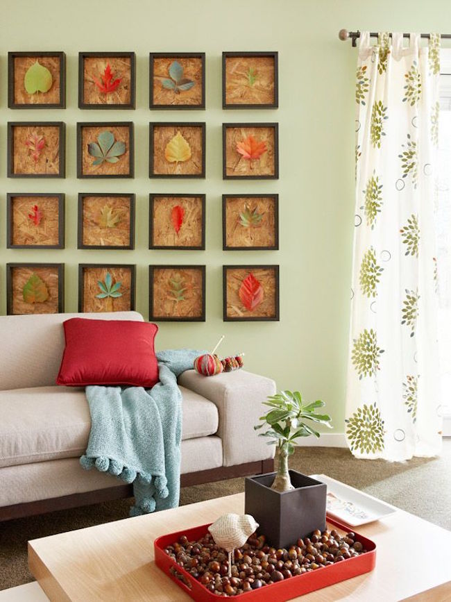 Framed leaves make a statement on a living room wall