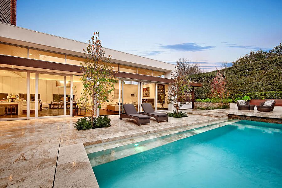 Glass doors connect the interior with the rear yard at all times