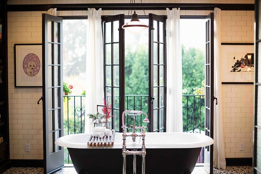 Gorgeous bathroom with black bathtub and vintage charm