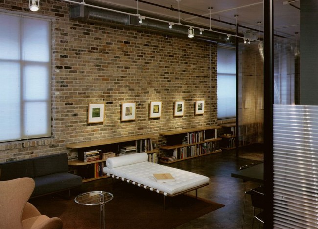 Gorgeous Lighting And Brick Wall Create An Art Gallery Styled Display In The Downtown Austin Home 650x467 