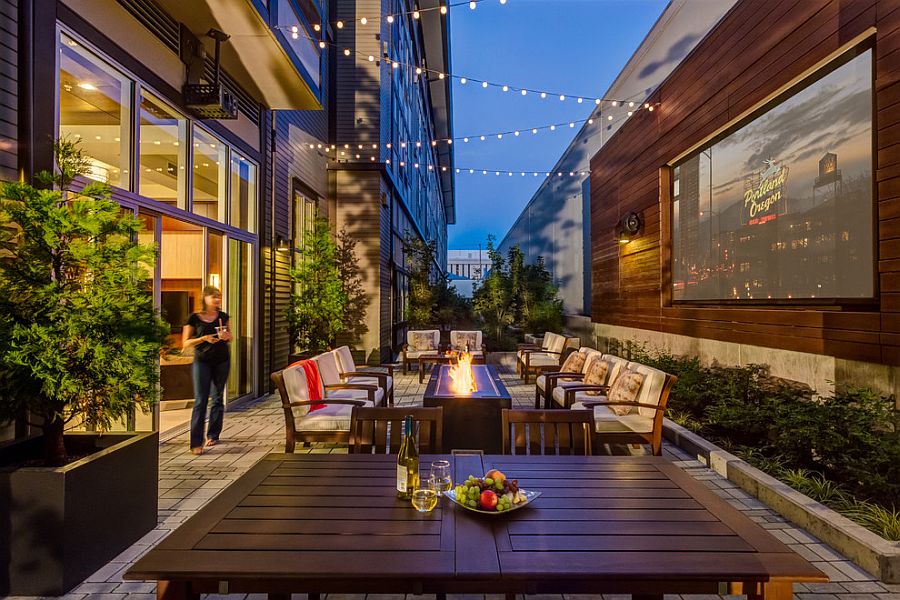 Gorgeous use of string lighting for the patio home theater [Design: Shapiro Didway]