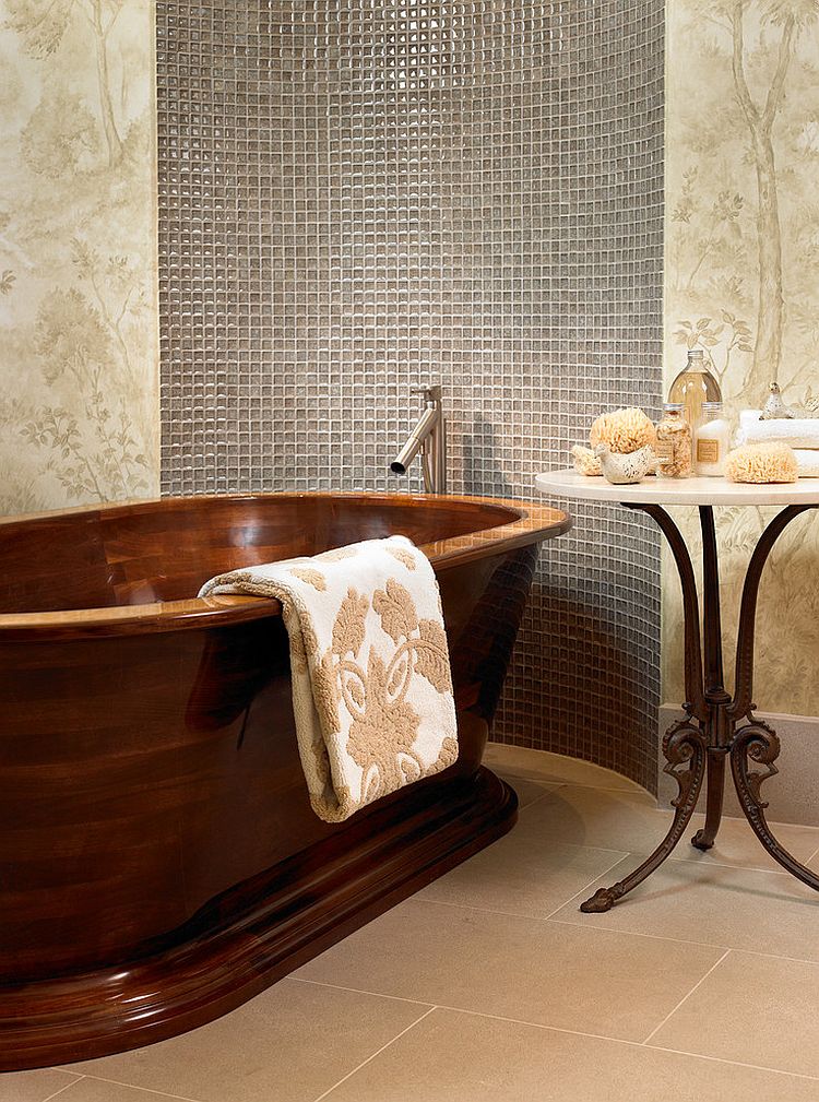 Handcrafted walnut bathtub and Satyr side table for the small bathroom [Design: Beckwith Interiors]