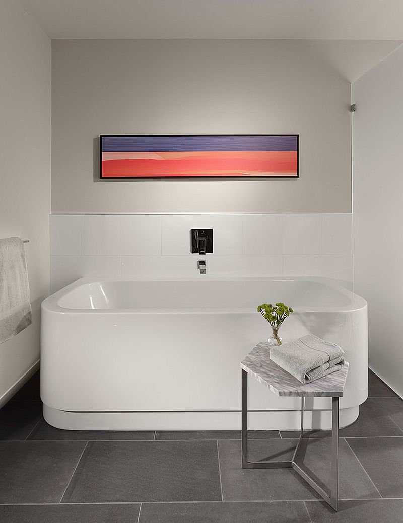 Hex side table with white marble top in the contemporary bathroom [Design: McGriff Architects]