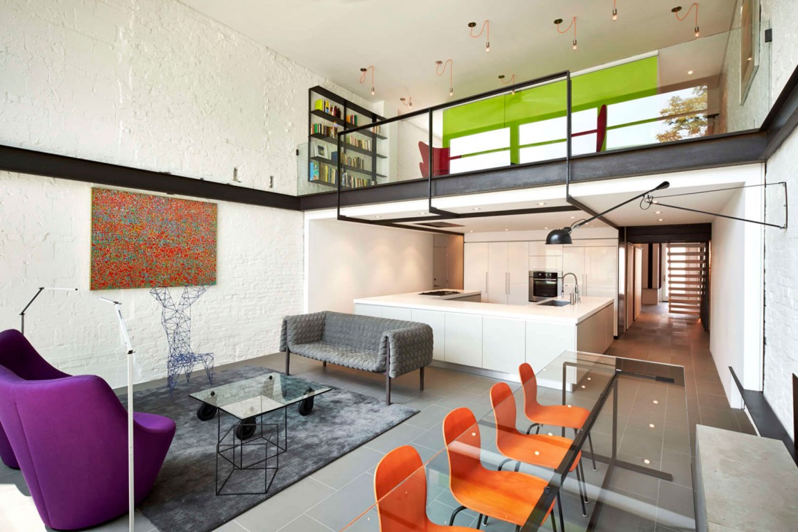 Hints of orange and purple in the living space of the transformed row house