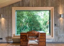 Home-workspace-with-a-classic-desk-and-chair-and-a-window-that-offers-panoramic-views-217x155