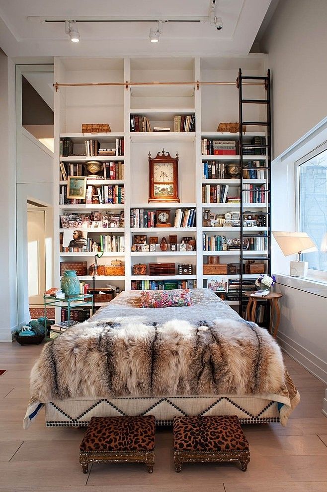 Incredible bookshelf that reaches all the way up to the high ceilings