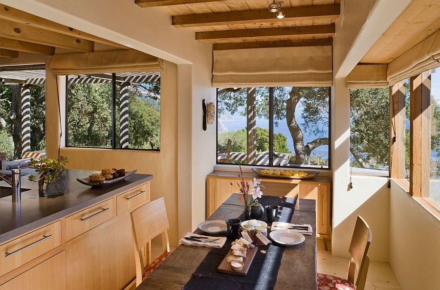 Indoor dining area of the cabin placed to make the most of scenic view outside