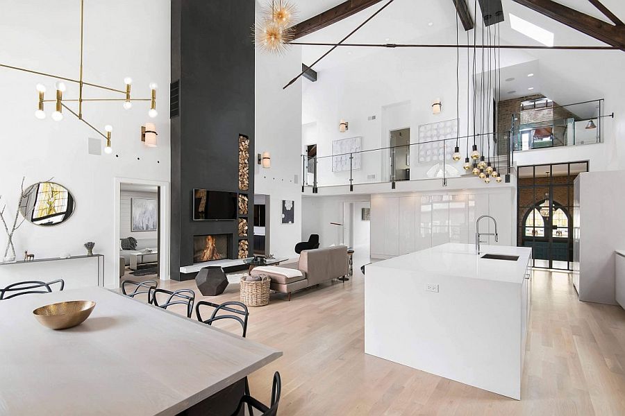 Industrial lighting fixtures and polished decor add to the eclectic vibe of the church conversion