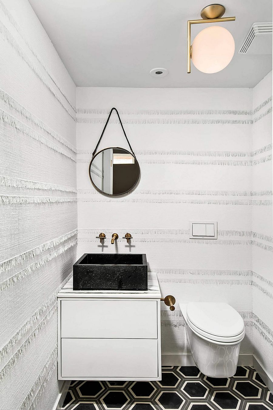 Ingenious textured wallpaper for the small powder room