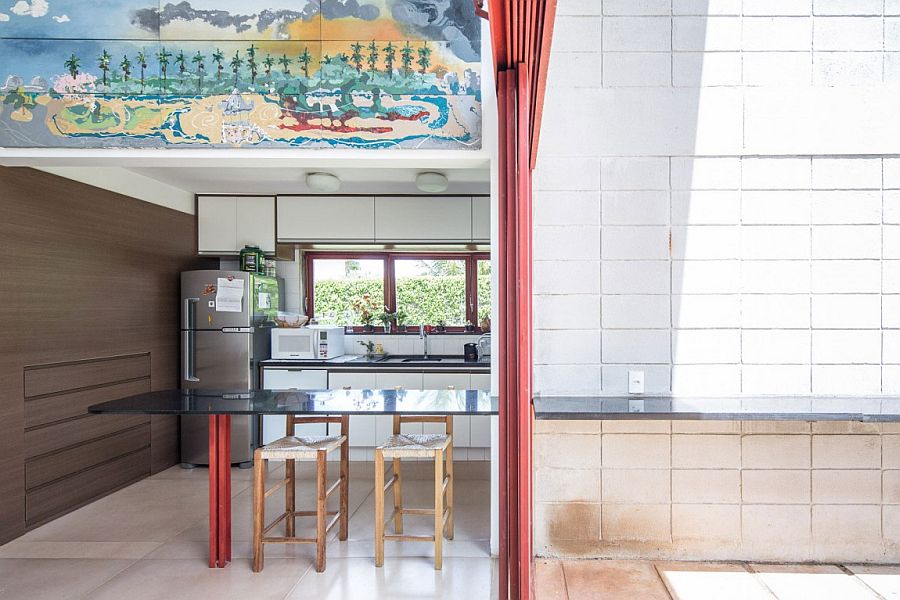 Interesting use of wall art above the kitchen nook