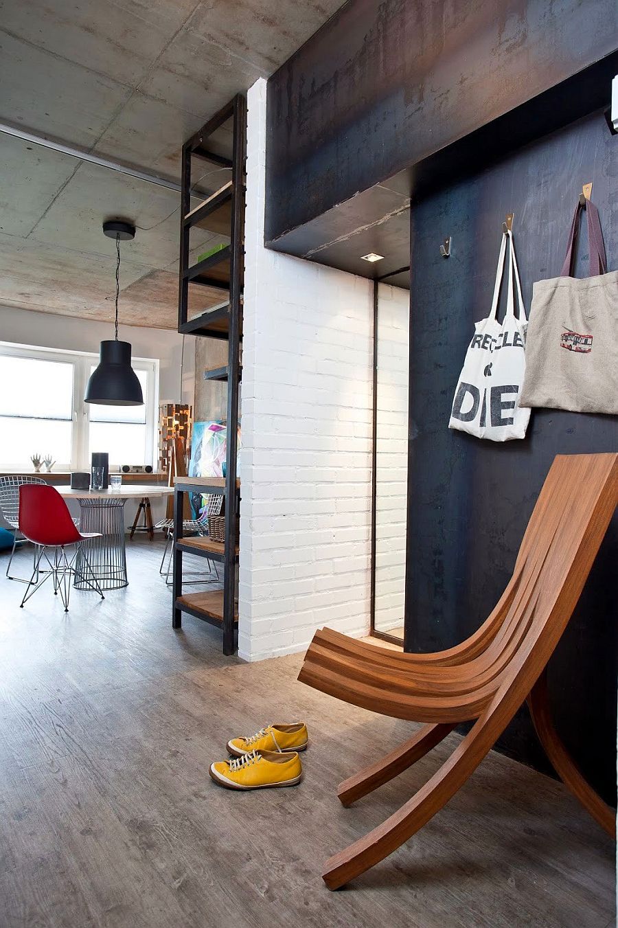 Interior of the small Russian apartment with brick, metal and concrete walls