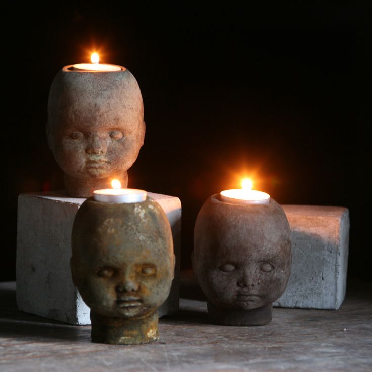 Doll head candle holders