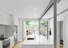 Kitchen-in-white-connected-with-the-exterior-217x155