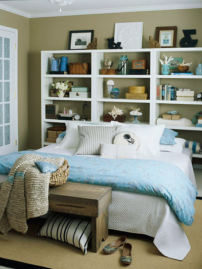 Large and wide white bookshelf with beach-themed accessories