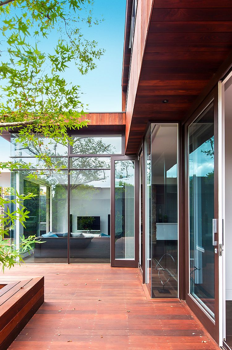 Large glass walls and doors create a beautiful indoor-outdoor interplay