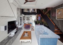 Living-area-combines-light-and-dark-elements-to-create-curated-chaos-217x155
