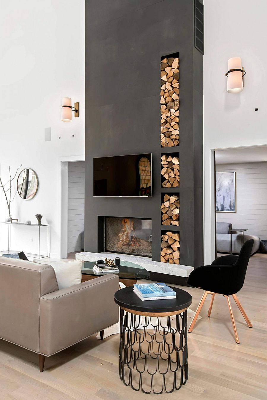 Living room of the Church conversion with gray accent fireplace wall