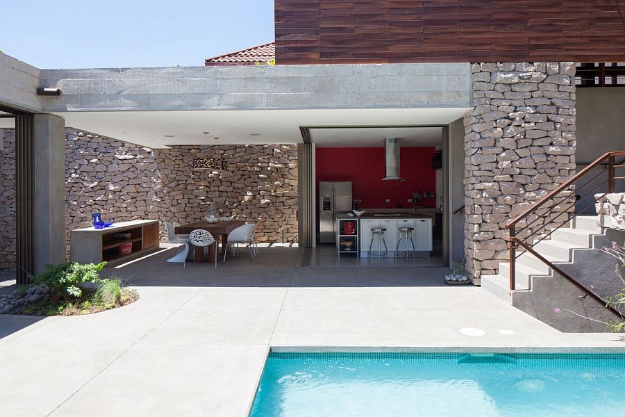 Lovely pool area of the Garden House epitomizes its indoor-outdoor interplay