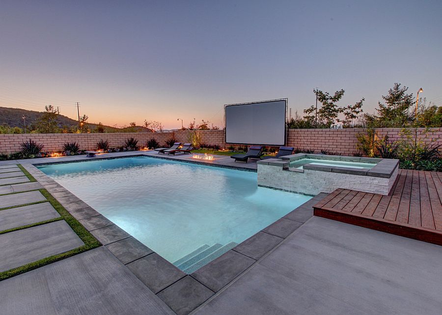 Lovely, relaxing pool area with giant screen for an outdoor movie night [Design: Aqua-Link Pools and Spas]