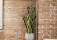 Modern-decor-sits-in-the-living-room-with-brick-wall-background-217x155