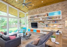 Natural-brick-wal-large-glass-windows-and-a-slanted-ceiling-for-the-modern-living-room-217x155