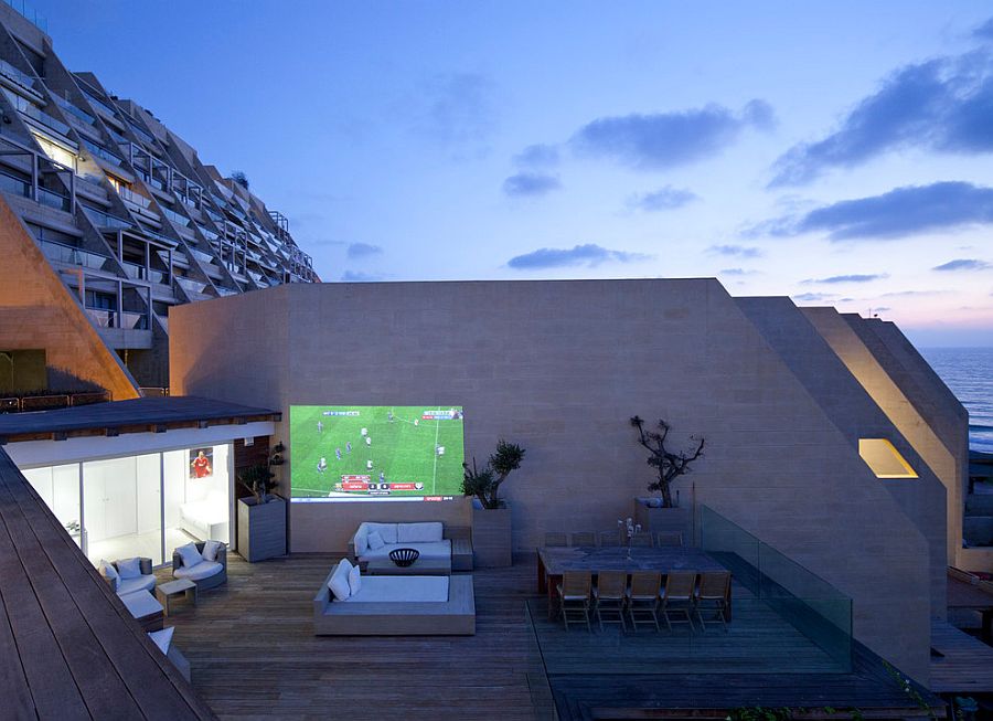 Outdoor movie night on the deck for the contemporary, urban home