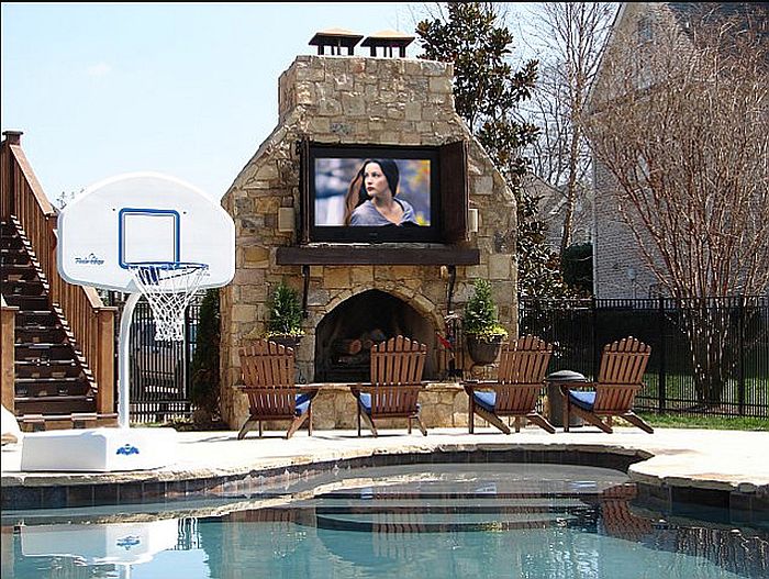 Outdoor movie zone next to the pool