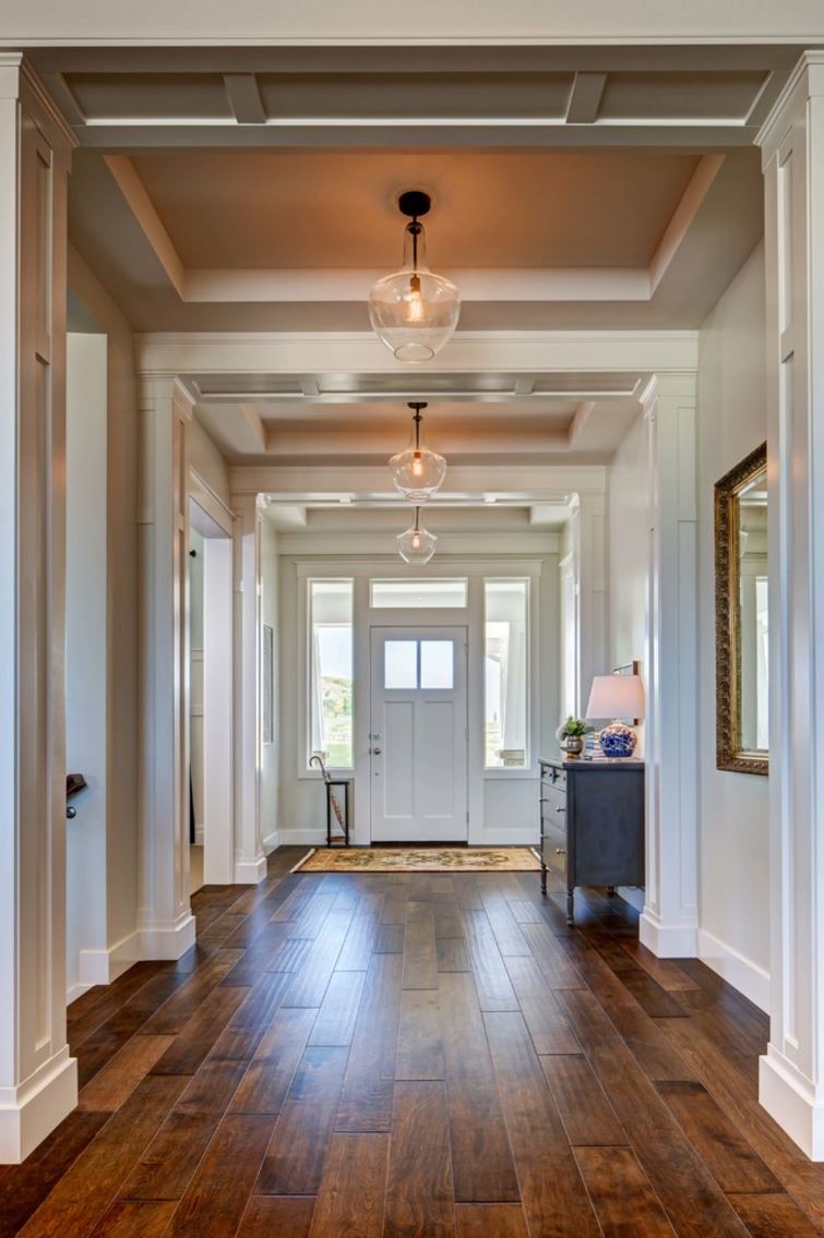 Pendant lighting in a hallway with a recessed ceiling