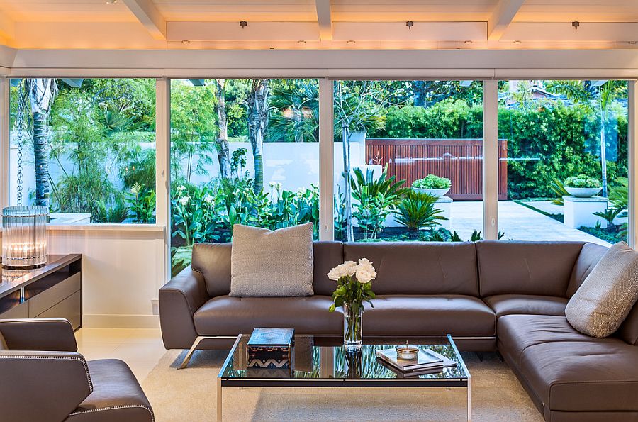 Plush gray couch and lovely lighting for the midcentury living room