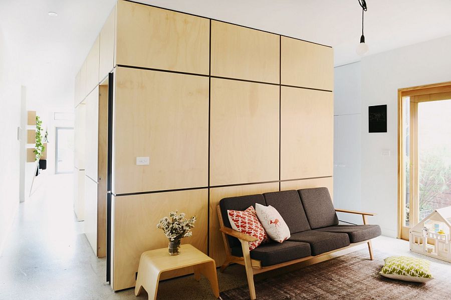 Ply wood clad pod contains the bathroom, powder room and pantry