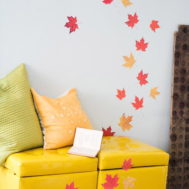 Pressed leaves attached to wall and furniture