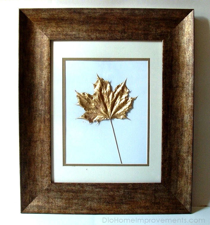 Pressed leaves painted in gold