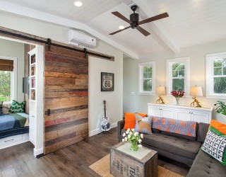 25 Ingenious Living Rooms That Showcase the Beauty of Sliding Barn Doors