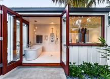Relaxing-bathroom-with-standalone-bathtub-opens-up-into-the-landscape-outside-217x155