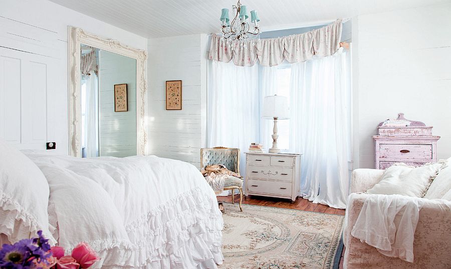 Renaissance Mirror is the statement piece in this soothing white and pastel blue bedroom [Design: Rachel Ashwell Shabby Chic Couture / Amy Neunsinger]