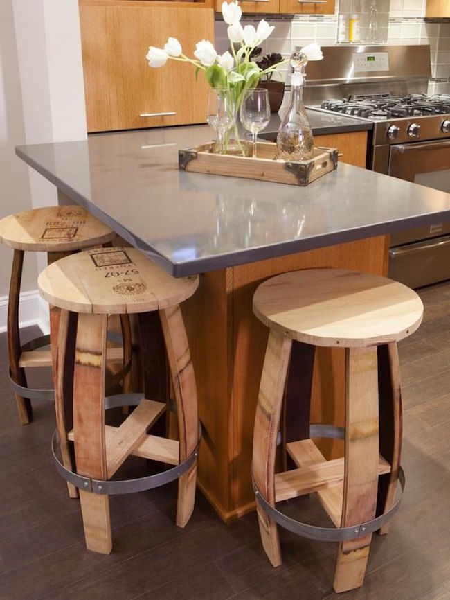 Rustic bar stools made from old wine barrels