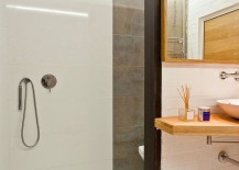 Shower-area-of-the-small-bathroom-in-tile-and-concrete-217x155