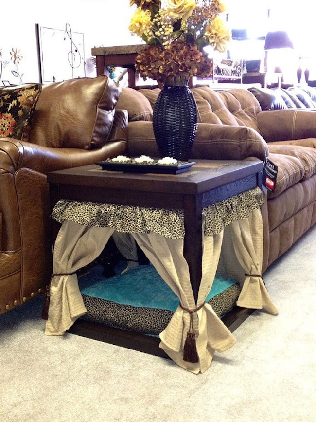 Side table transformed into a pet bed with miniature curtains