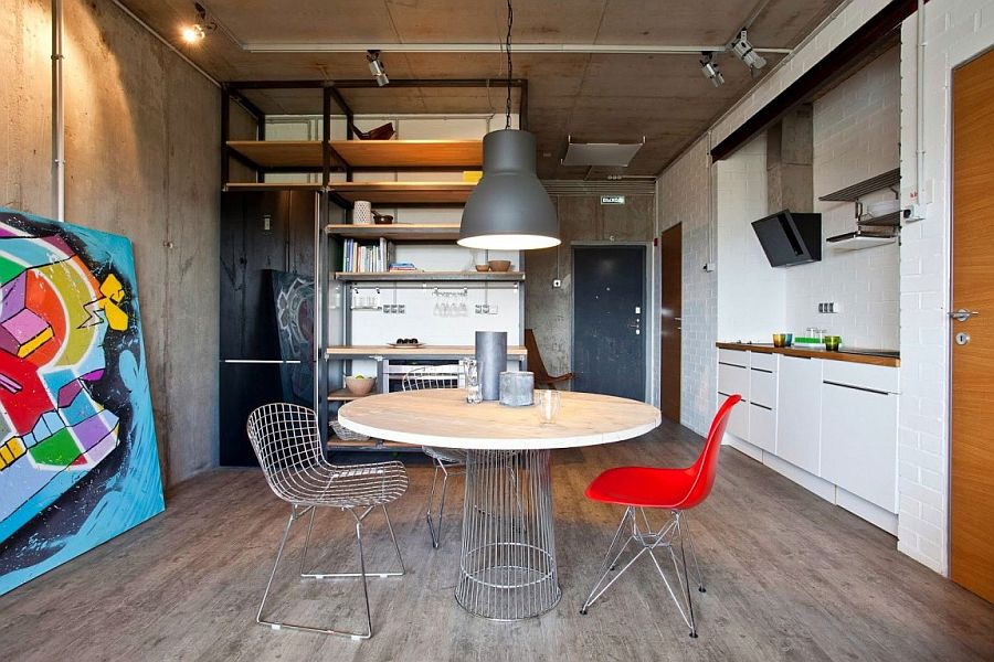 Simple decor and colorful art work add elegance to the industrial setting