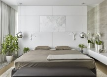 Soft-white-leather-headboard-wall-bedside-pendants-and-greenery-fashion-a-rejuvenating-bedroom-217x155