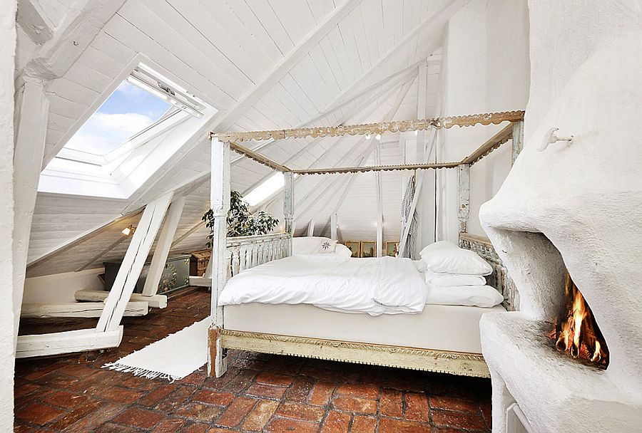 Stunning shabby chic bedroom with a cozy fireplace