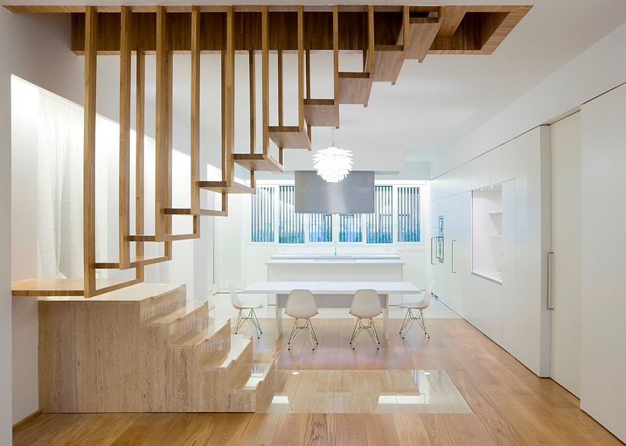 Suspended timber steps create a wonderfully unique staircase for the minimal home