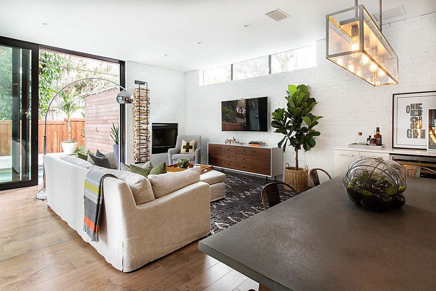 Transitional living room with plenty of natural light [Design: Steele Street Studios]