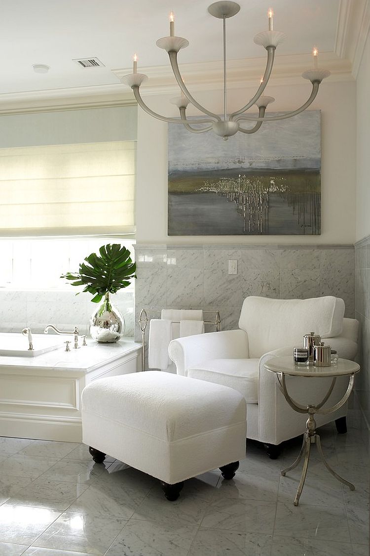 Turn the bathroom into a relaxing hangout with club chair, ottoman and side table [Design: Lynne Scalo Design]