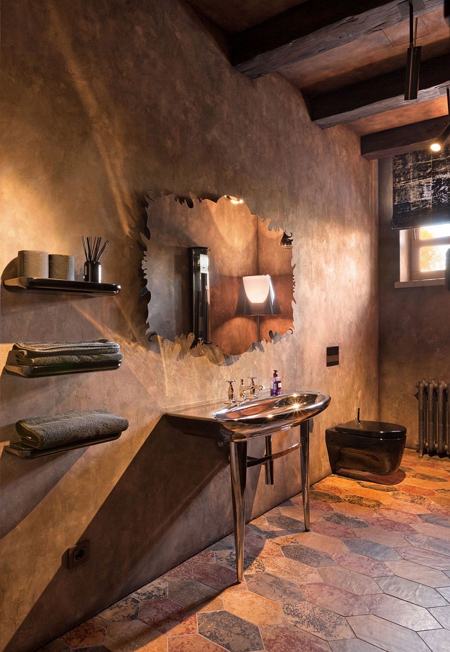 Unique bathroom mirror ends up being the showstopper in the tuscan styled space