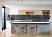 Upper-kitchen-cabinet-and-bar-stools-add-warmth-of-wood-to-the-modern-kitchen-217x155
