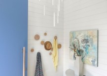 White-and-blue-at-the-entrance-sets-the-tone-for-the-beach-house-217x155