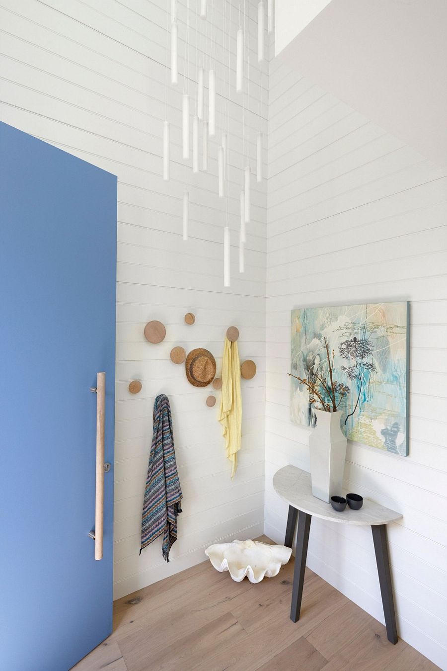 White and blue at the entrance sets the tone for the beach house