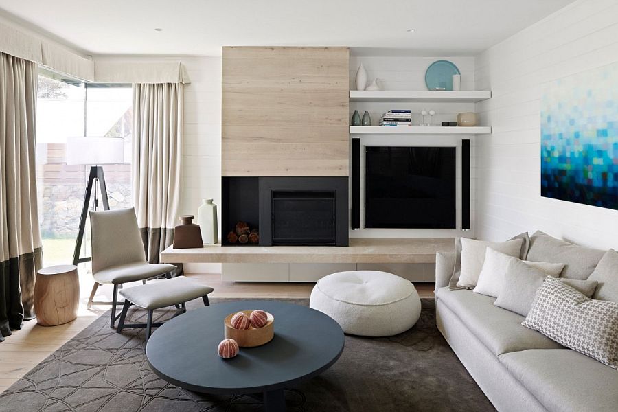 White walls and  limed oak timber fashion the contemporary living room